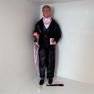 BARBIE    Sparkle Surprise Ken doll, with surprises for Barbie. 1991